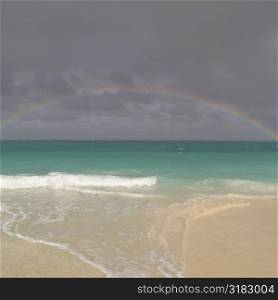 Rainbow over ocean at Parrot Cay