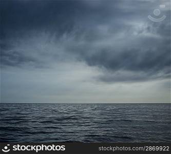 Rainy clouds over an ocean