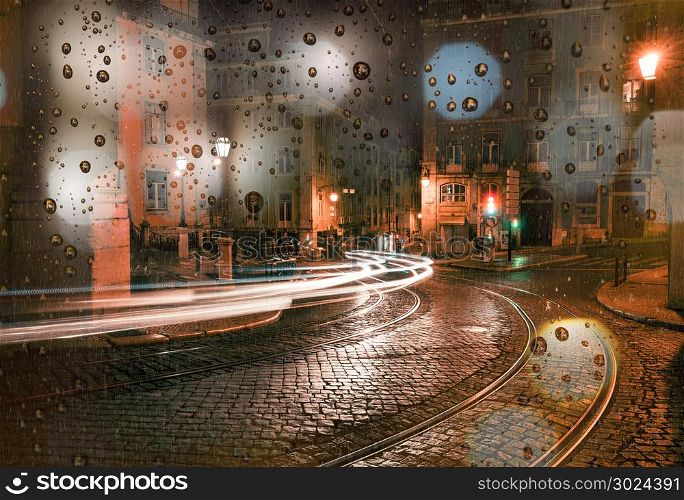 Rainy day in the city at night, traffic car and city lights on the street. Rainy day in the city at night