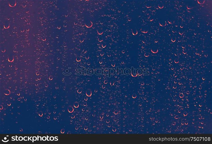 Rainy night background, rain drops in red light on the window at night, autumn season backdrop, abstract textured wallpaper, cold autumnal weather