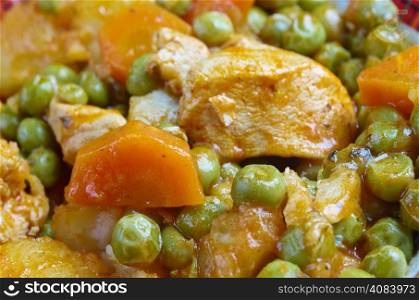 ?rakos - greek cuisine.green peas with tomato sauce and potatoes.