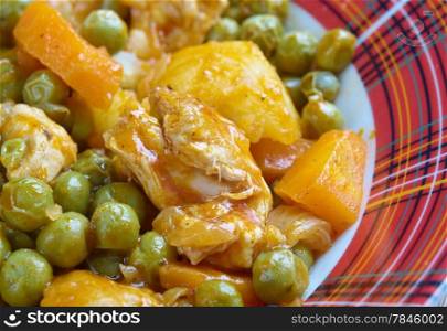 ?rakos - greek cuisine.green peas with tomato sauce and potatoes.