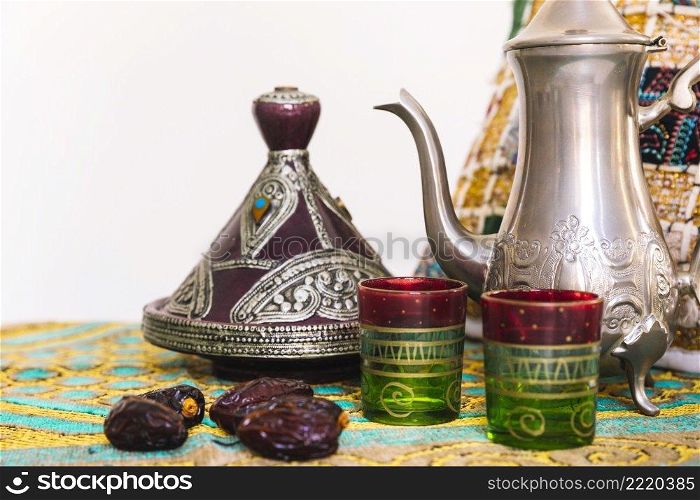 ramadan concept with tea set dates
