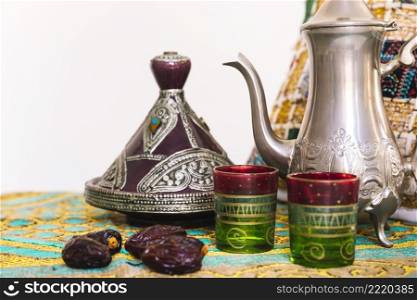 ramadan concept with tea set dates