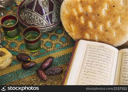 ramadan concept with tea set quran