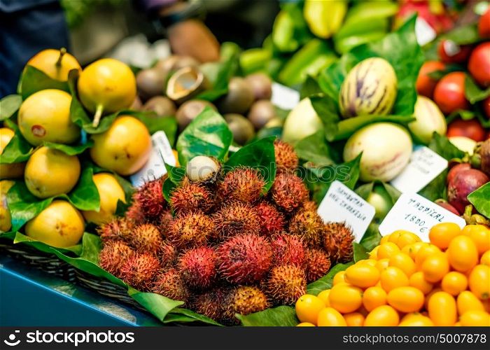 Rambutan and other tropical exotic fruits on street market