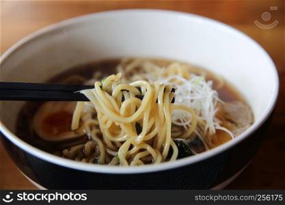 Ramen noodle japanese food on wood background