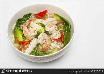 ramen, typical asian dish in bowl on white background