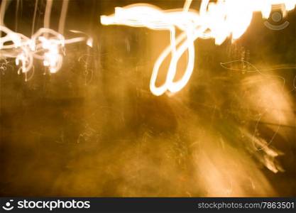 random figures from cigarette smoke in a dark room. abstraction.