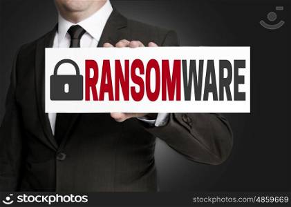 ransomware protection is held by businessman. ransomware protection is held by businessman.
