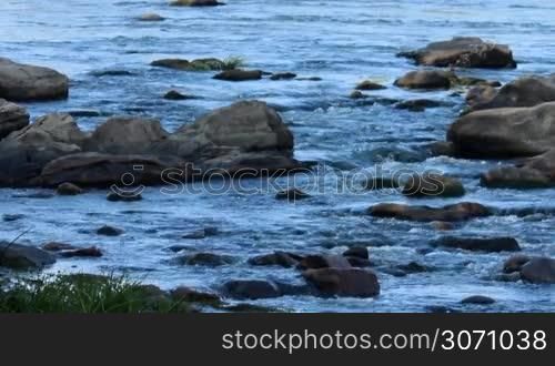 rapid flow of the river through the stones