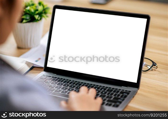 Rare view of asian young woman freelancer working with laptop computer at workplace at home office, during quarantine covid-19 self isolation at home, work from home concept