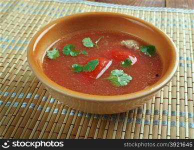 Rasam soup - South Indian soup.prepared using tamarind juice as a base, with the addition of tomato, chili pepper, pepper, cumin