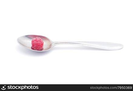 raspberries and spoon on a white background