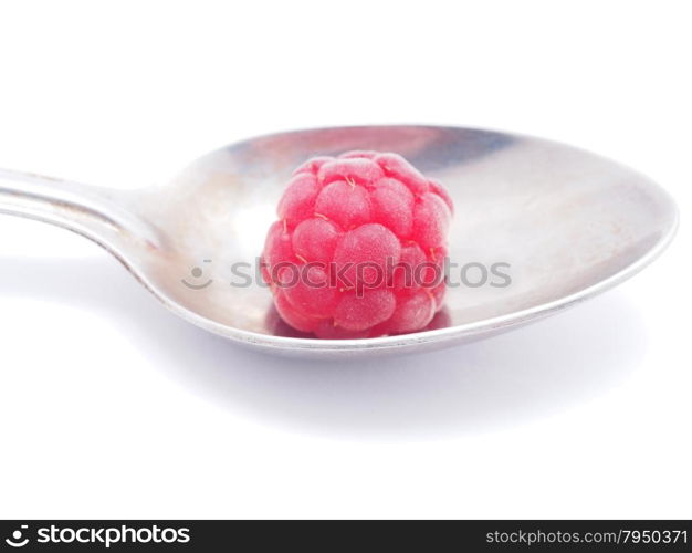 raspberries and spoon on a white background