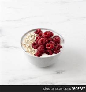 raspberries fruit snack with muesli milk