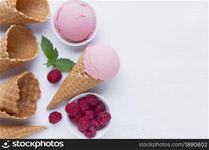 raspberries ice cream cones table. Resolution and high quality beautiful photo. raspberries ice cream cones table. High quality and resolution beautiful photo concept