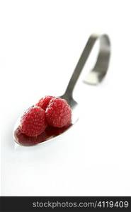 Raspberries in a spoon