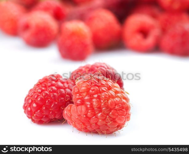 Raspberries isolated on white with fruit background