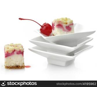 Raspberry Cheesecake Slices On White Background, Close Up