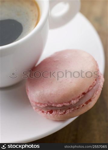 Raspberry Macaroon with a Cup of Espresso