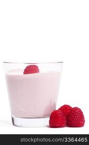 raspberry on a milkshake with raspberries aside. raspberry on a milkshake with raspberries aside on white background