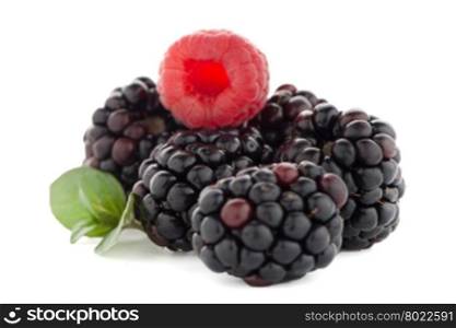 Raspberry with blackberry on white background.