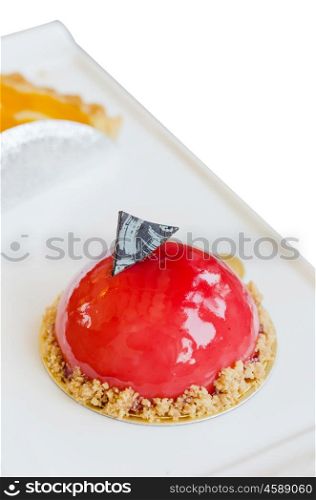 Raspberry yogurt mousse , sweet red dessert on plate