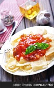 ravioli with tomato sauce on the plate