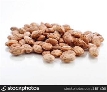 raw beans on white background