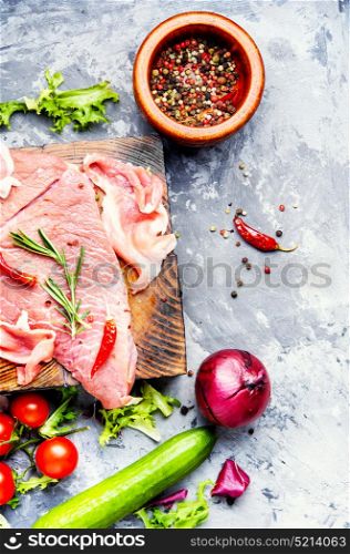 Raw beef meat. Raw beef fillet steaks with rosemary and spices.Raw meat