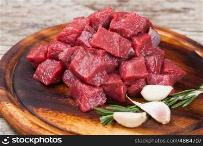 Raw beef meat. Raw beef meat on a cutting board