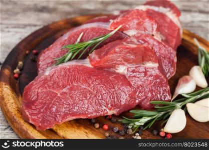 Raw beef meat. Raw beef meat on a cutting board