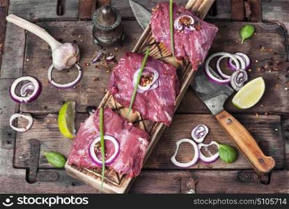 Raw beef meat. Raw veal meat.Raw beef meat steak on wooden rustic table