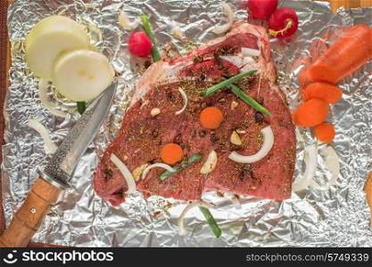 Raw beef meat seasoned and ready to cooked. beef meat