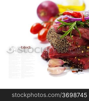 Raw beef steak and vegetables over white (with easy removable sample text)