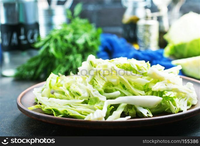 raw cabbage, cabbage on plate, fresh cabbage