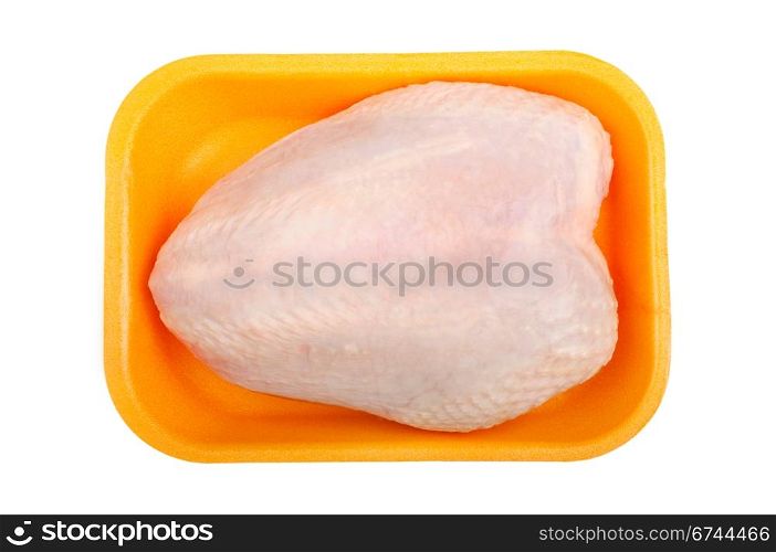 raw chicken breast in a plastic tray isolated on white background