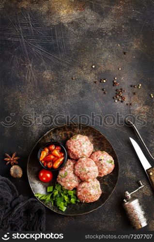 raw cutlets with salt and spice, minced meat on plate