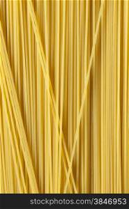 Raw dried traditional Italian spaghetti full frame