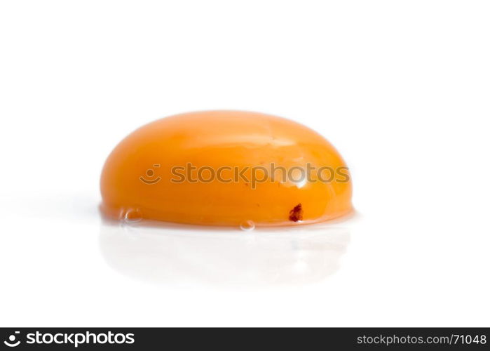 raw egg yolk isolated on white background