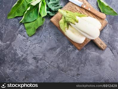 raw eggplant on a table, stock photo