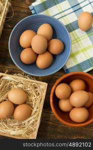 Raw eggs on a blue napkin. Healthy meal