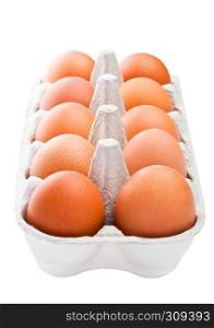 Raw farm fresh eggs in white paper tray isolated on white background