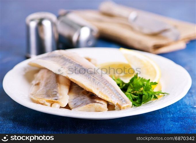 raw fish fillet with salt and spice