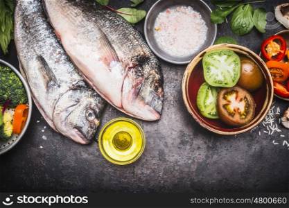 Raw Fish with vegetables, healthy food and diet cooking concept, top view