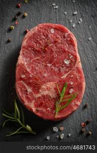 Raw fresh marbled meat Steak on ardesia stone