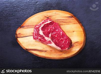 raw fresh meat on a wooden board