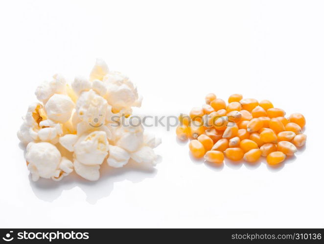 Raw golden sweet corn and popcorn seeds on white background