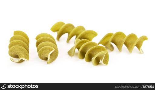 raw green spiral pasta fusilli, isolated on white. Raw Green Spiral Pasta